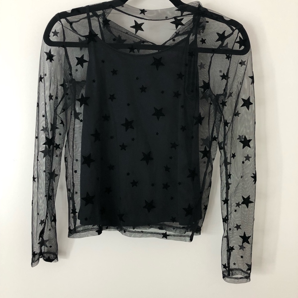 Sheer black top with stars